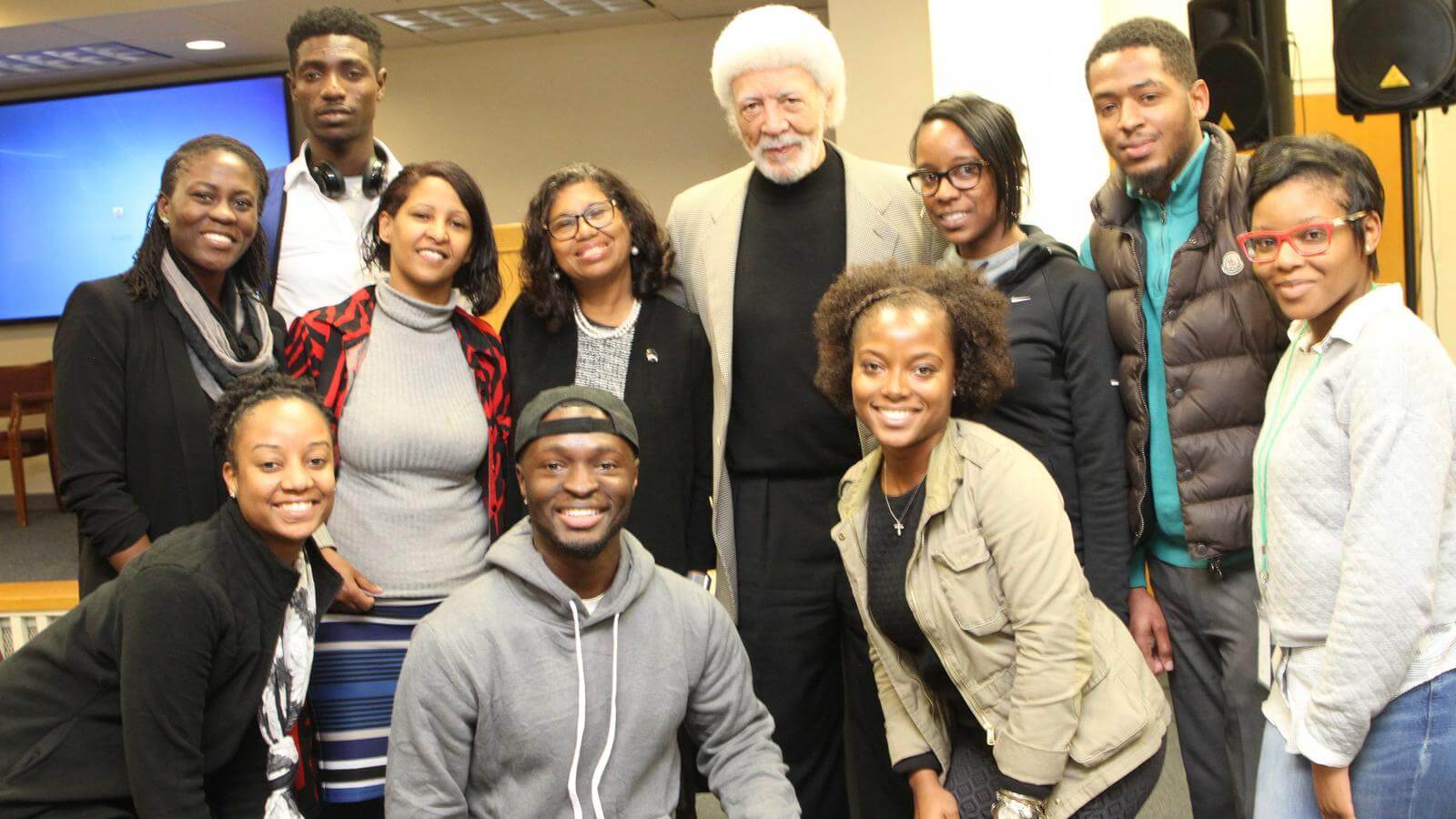 Ron Dellums in group photo with students