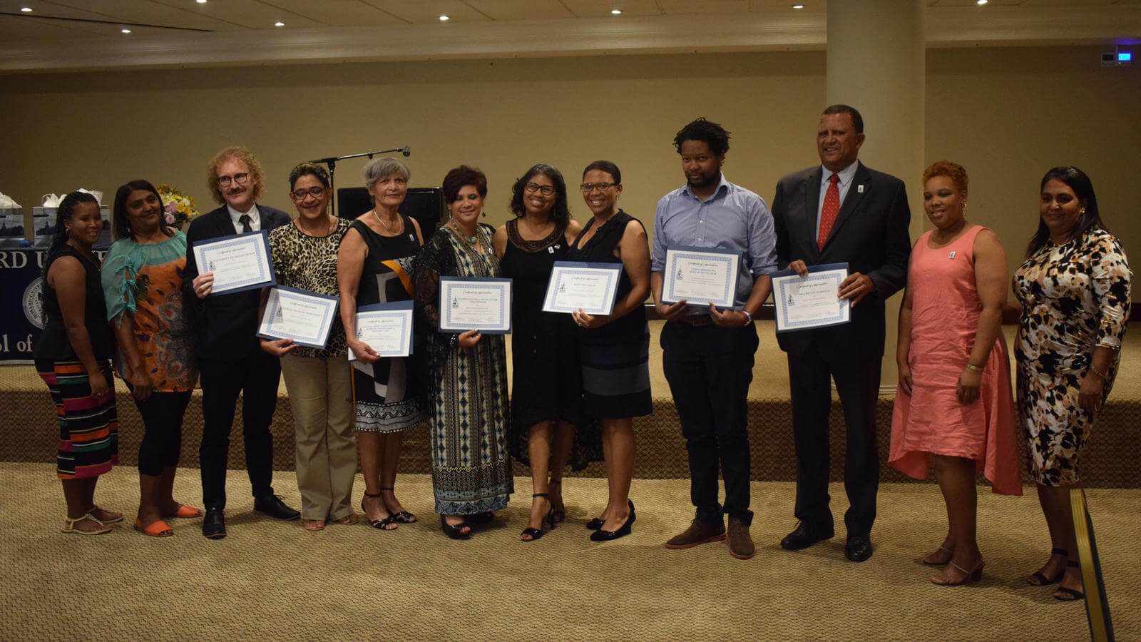 people presenting their certificates